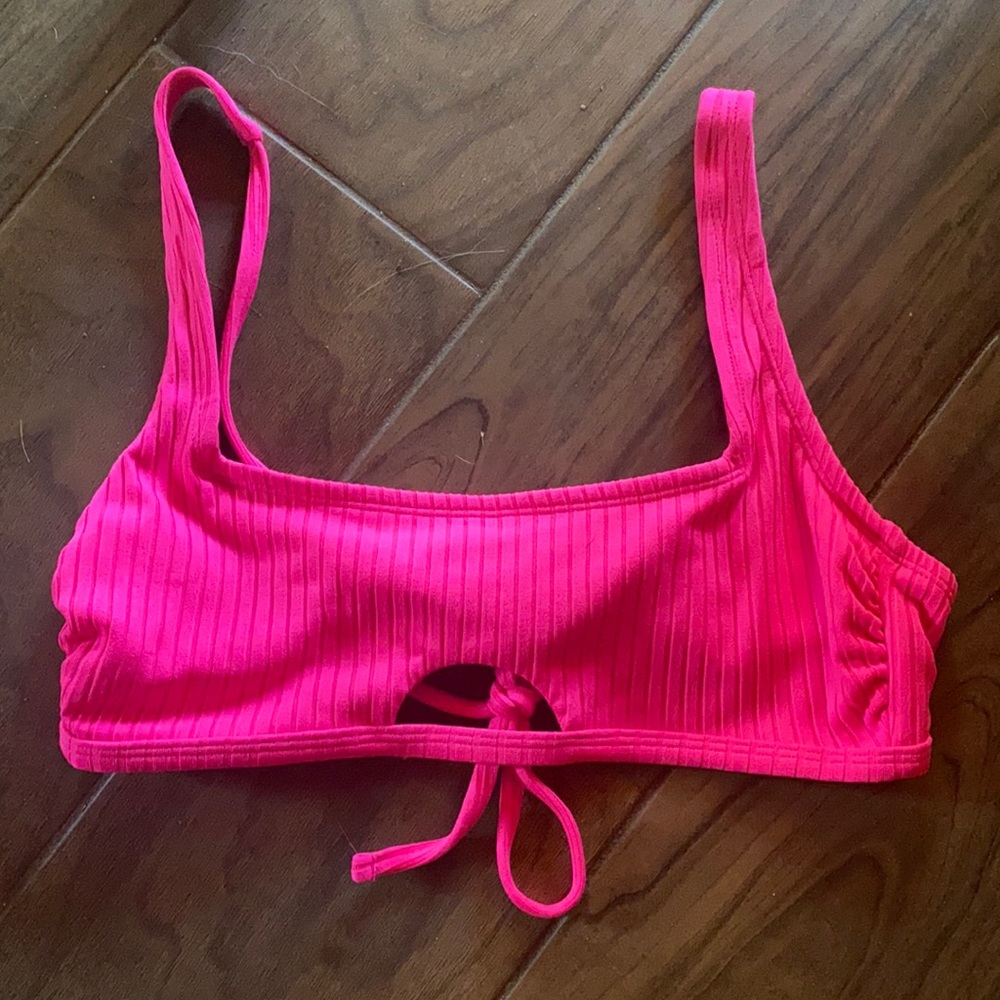 Neon pink keyhole cutout bikini top from Target.